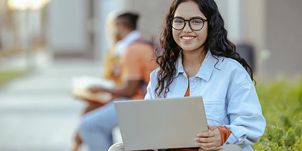 a student looking at her tablet
